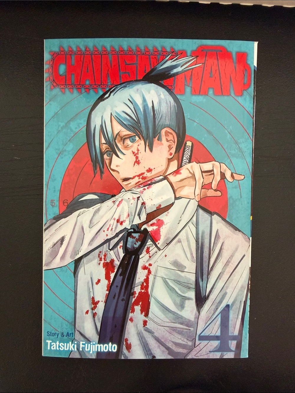 Chainsaw Man Volume 4 Manga Cover — Blue & Red Artwork